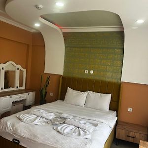 Kamer met een Queen Size Bed